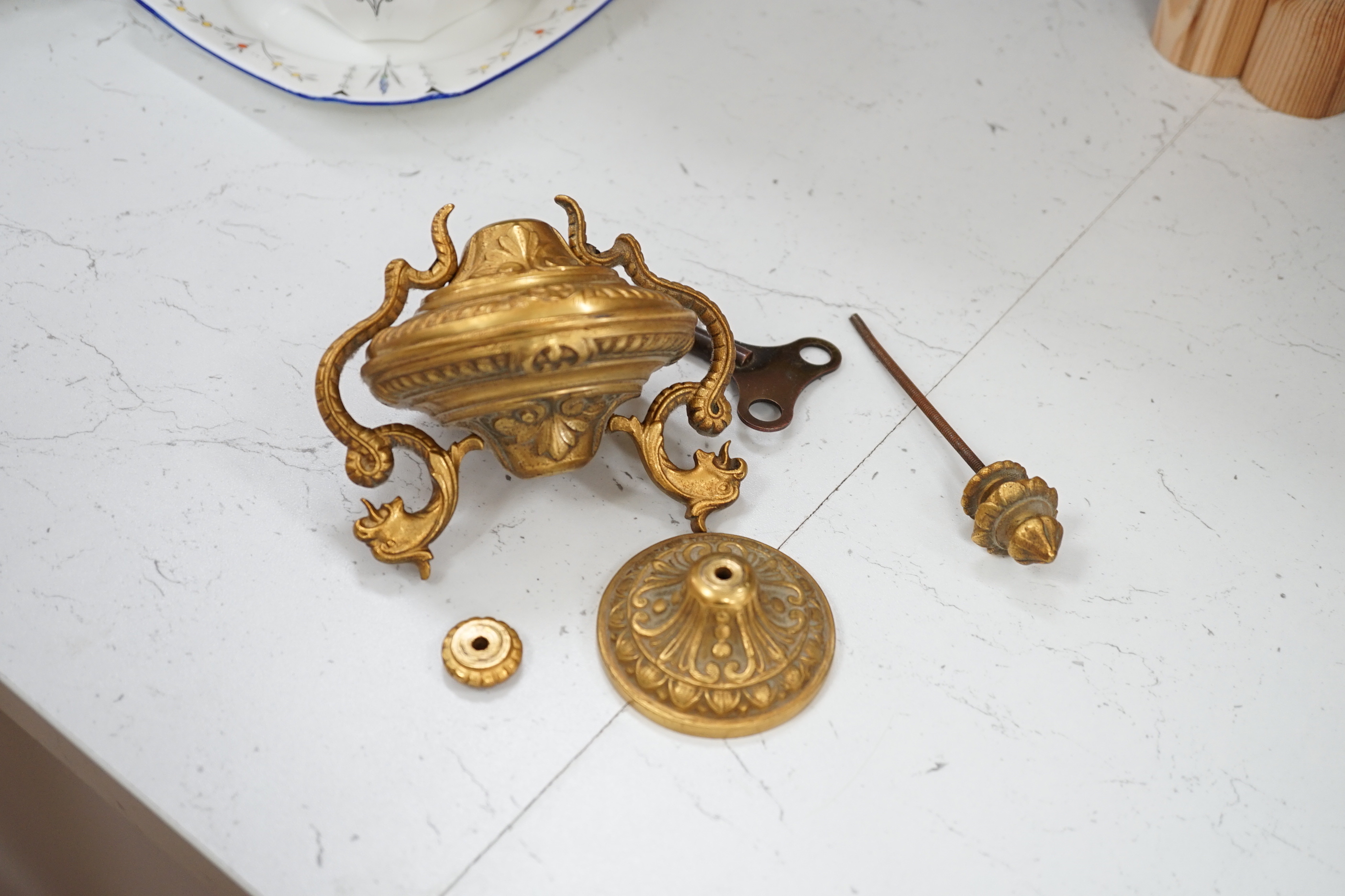 A French brass mantel clock, c.1900- no pendulum, loose finial, 37cm excl finial